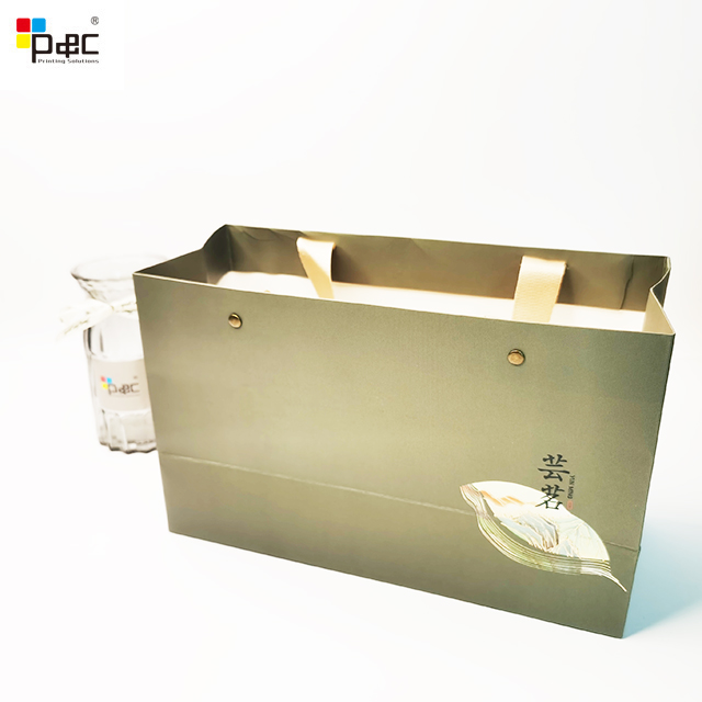 High quality custom clothes shopping bag paper packaging manufacturer paper bag for clothing shoes handle bag with logo